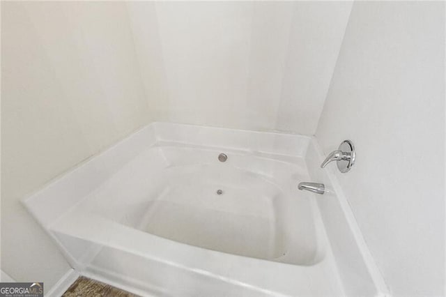 full bathroom featuring a bath