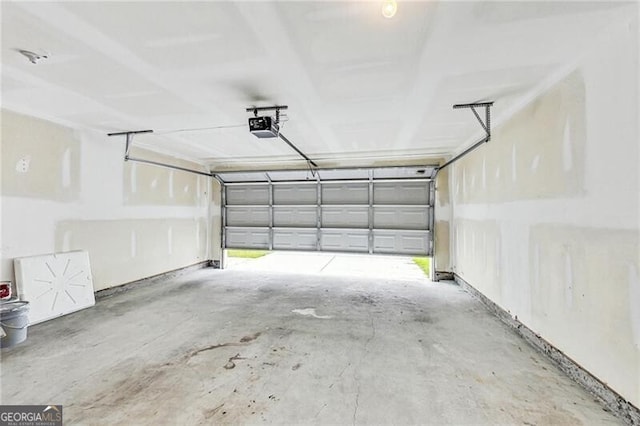 garage featuring a garage door opener