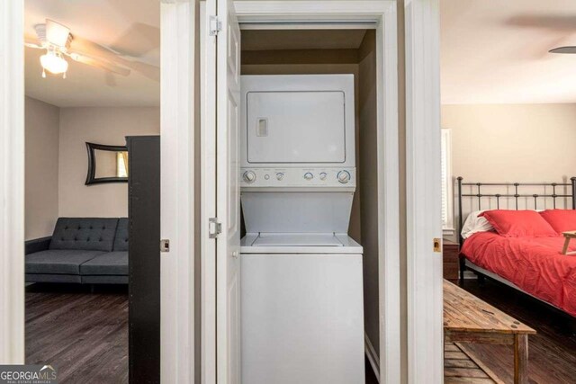 3224 Canary Ct, Decatur, GA 30032 - washroom with stacked washer / dryer, wood finished floors, and ceiling fan