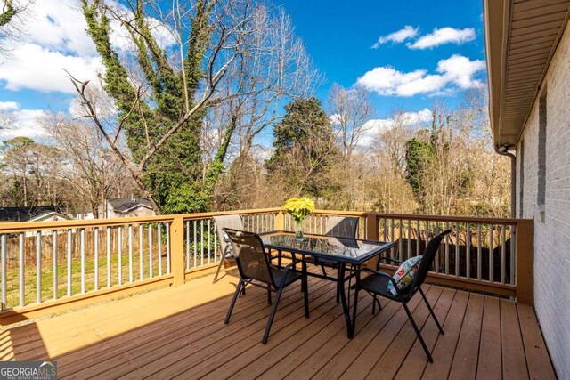 3224 Canary Ct, Decatur, GA 30032 - wooden deck featuring outdoor dining space
