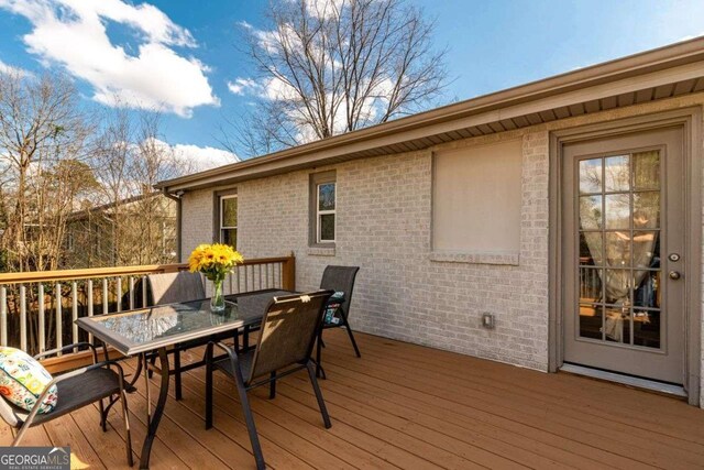 3224 Canary Ct, Decatur, GA 30032 - wooden terrace featuring outdoor dining area
