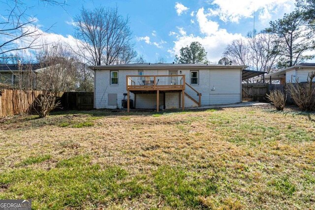 3224 Canary Ct, Decatur, GA 30032 - back of property featuring stairs, a deck, and a fenced backyard