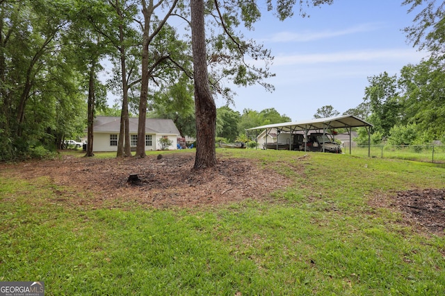 142 Dawn Cir, Brunswick, GA 31523 - view of yard featuring a carport