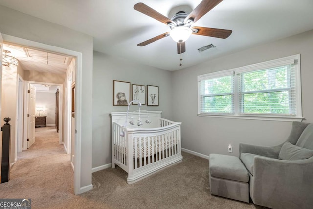 bedroom featuring carpet floors, attic access, and baseboards