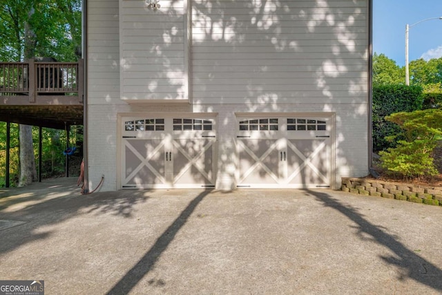 garage featuring driveway
