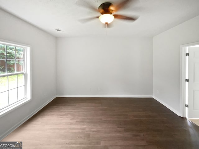 5480 Walnut Ln, Lithonia, GA 30038 - empty room with a ceiling fan and wood finished floors