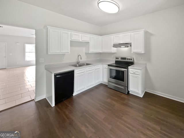 5480 Walnut Ln, Lithonia, GA 30038 - kitchen featuring electric range, black dishwasher, under cabinet range hood, light countertops, and white cabinetry