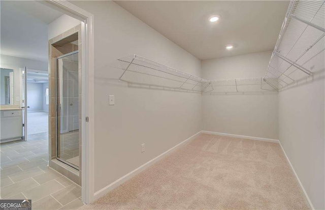 612 Sidney Ct, Stockbridge, GA 30281 - spacious closet featuring light colored carpet