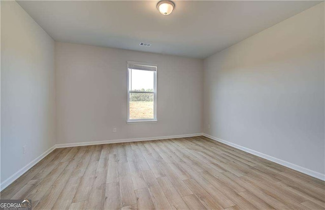 612 Sidney Ct, Stockbridge, GA 30281 - spare room with light wood-style flooring and baseboards