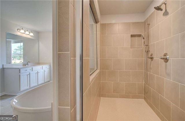 612 Sidney Ct, Stockbridge, GA 30281 - full bathroom with a tile shower and vanity