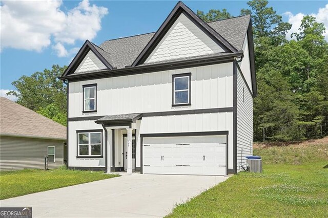 166 Wagon Trail Cir, Fairmount, GA 30139 - traditional-style home with concrete driveway, a garage, a front yard, and roof with shingles