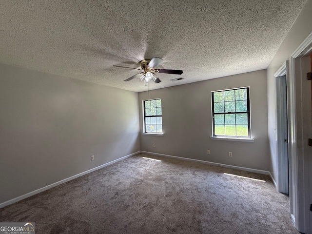 1397 Coalition Cir, Hinesville, GA 31313 - carpeted empty room featuring ceiling fan, baseboards, and a textured ceiling