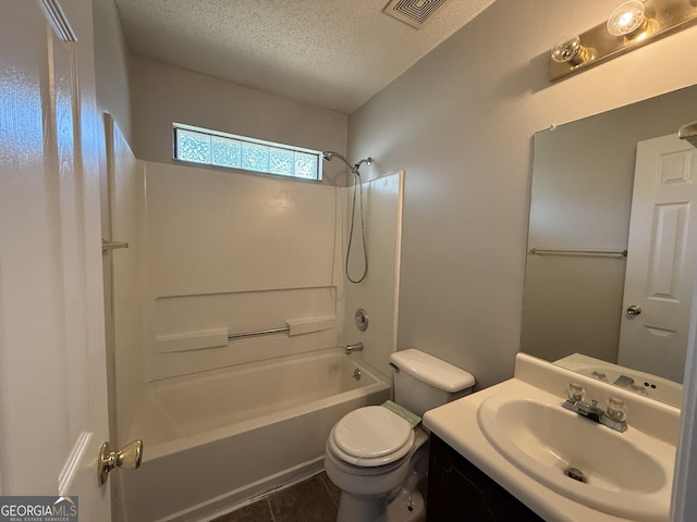 1397 Coalition Cir, Hinesville, GA 31313 - full bath with a textured ceiling, washtub / shower combination, toilet, and vanity
