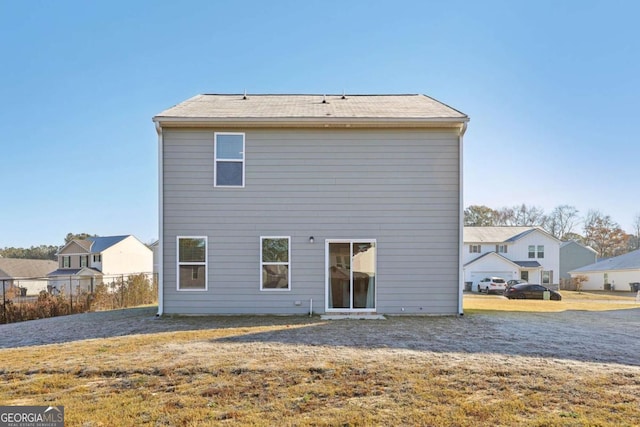 130 Maple Dr, Milner, GA 30257 - rear view of house with fence