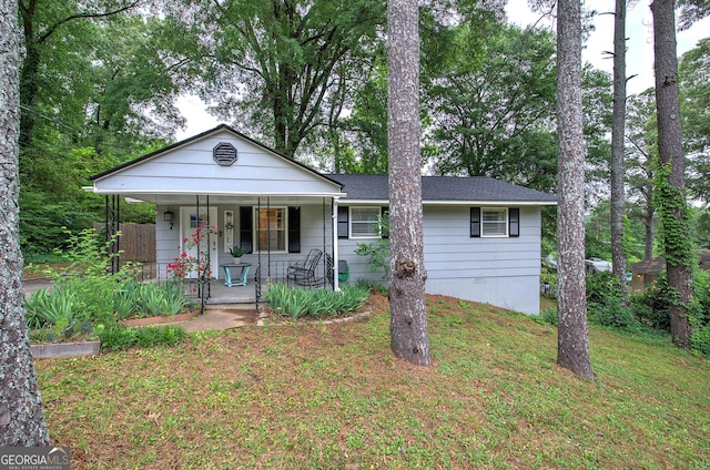 7 Valley View Dr, Cartersville, GA 30120 - ranch-style house with a porch, a front lawn, and a shingled roof