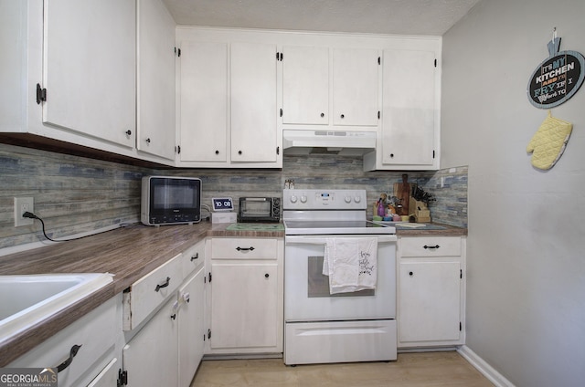 7 Valley View Dr, Cartersville, GA 30120 - kitchen featuring white electric range oven, under cabinet range hood, backsplash, and white cabinetry