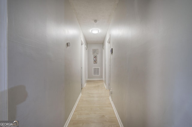 7 Valley View Dr, Cartersville, GA 30120 - hall with light wood finished floors and a textured ceiling