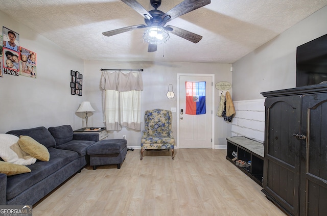 7 Valley View Dr, Cartersville, GA 30120 - living room with a textured ceiling, light wood-style floors, and ceiling fan