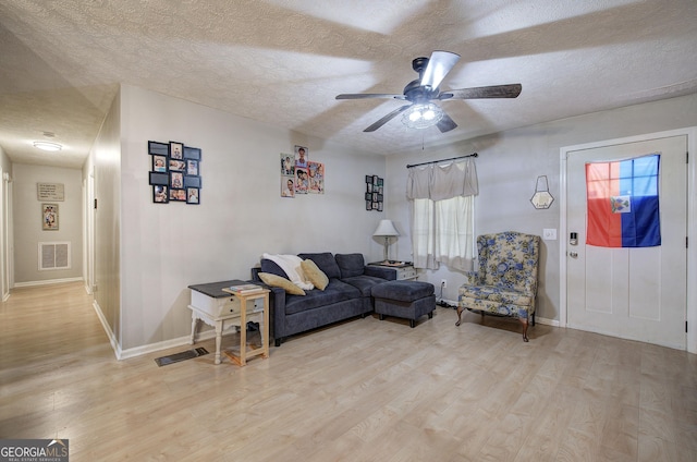 7 Valley View Dr, Cartersville, GA 30120 - living room featuring light wood-type flooring, ceiling fan, and a textured ceiling