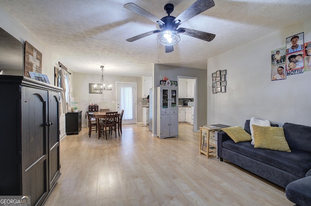 7 Valley View Dr, Cartersville, GA 30120 - living room with a chandelier, a textured ceiling, light wood-type flooring, and ceiling fan