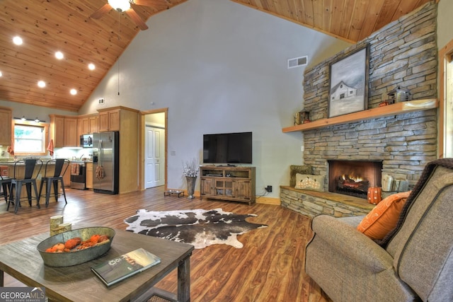 36 Rustic Barn Trl, Morganton, GA 30560 - living room featuring high vaulted ceiling, wood ceiling, recessed lighting, light wood finished floors, and a stone fireplace