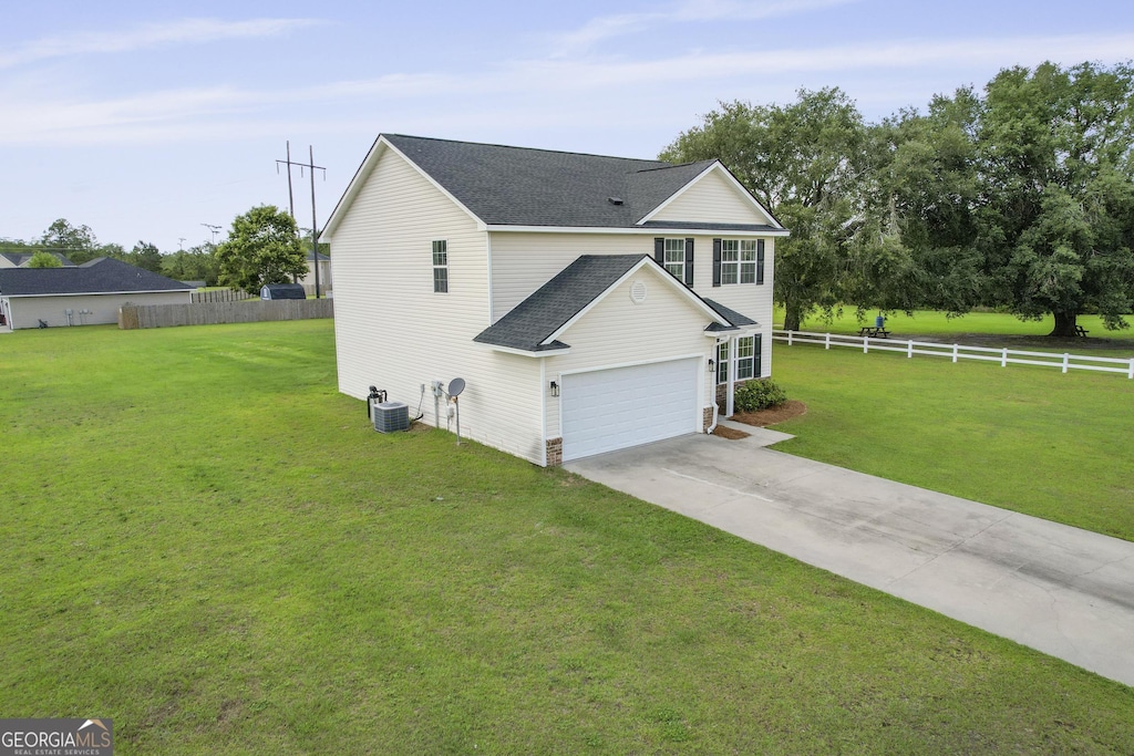 131 Mustang Ln NE, Ludowici, GA 31316 - view of front of home featuring roof with shingles, driveway, and cooling unit