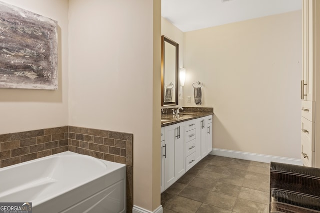 270 17th St NW Unit 1113, Atlanta, GA 30363 - bathroom with vanity, a bath, and baseboards