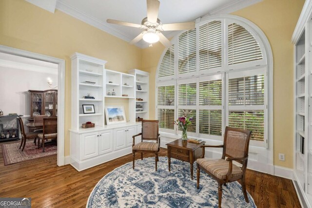 626 Kimberly Ln NE, Atlanta, GA 30306 - sitting room featuring ceiling fan, crown molding, and dark wood-type flooring