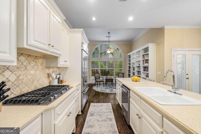 626 Kimberly Ln NE, Atlanta, GA 30306 - kitchen featuring a sink, stainless steel appliances, dark wood-style floors, recessed lighting, and light countertops