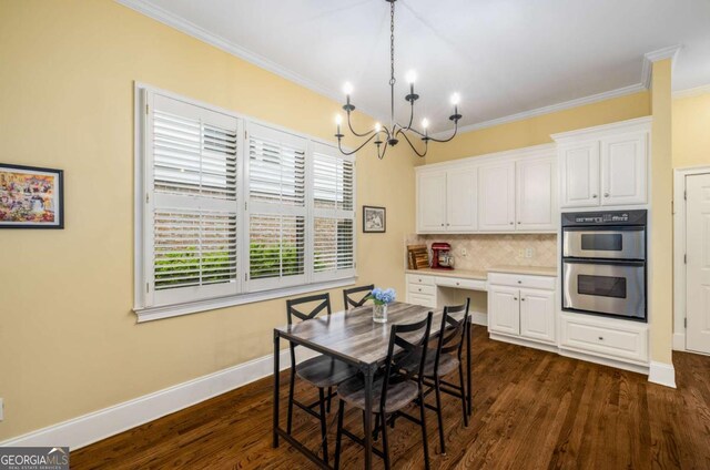 626 Kimberly Ln NE, Atlanta, GA 30306 - dining area featuring a chandelier, baseboards, crown molding, and dark wood finished floors