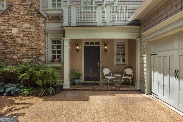 626 Kimberly Ln NE, Atlanta, GA 30306 - property entrance featuring a balcony and a porch