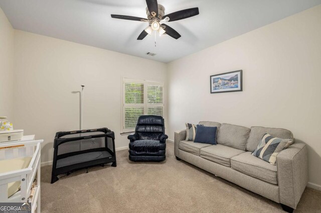 626 Kimberly Ln NE, Atlanta, GA 30306 - living room with carpet, ceiling fan, and baseboards