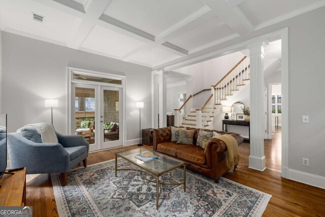 626 Kimberly Ln NE, Atlanta, GA 30306 - living room featuring ornate columns, coffered ceiling, stairs, french doors, and beamed ceiling