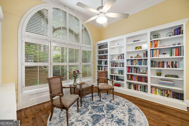 626 Kimberly Ln NE, Atlanta, GA 30306 - sitting room with a ceiling fan, wood finished floors, and crown molding