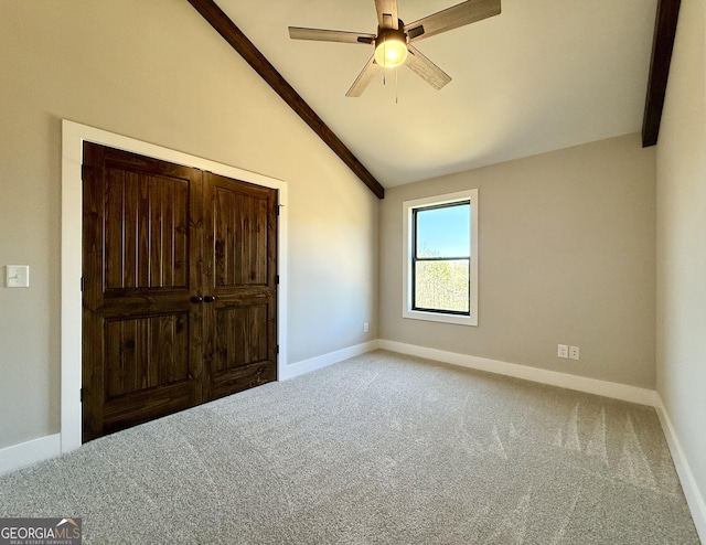 116 Boulder Ln, Cleveland, GA 30528 - unfurnished bedroom featuring lofted ceiling, carpet floors, baseboards, and a ceiling fan