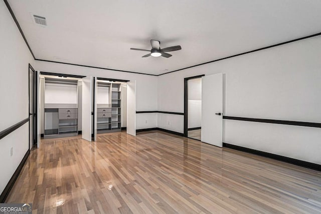 788 Sherwood Rd, Gainesville, GA 30501 - unfurnished bedroom featuring wood finished floors, baseboards, and ceiling fan