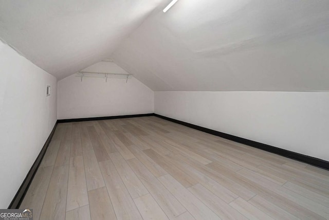 788 Sherwood Rd, Gainesville, GA 30501 - bonus room with light wood-style flooring, baseboards, and vaulted ceiling