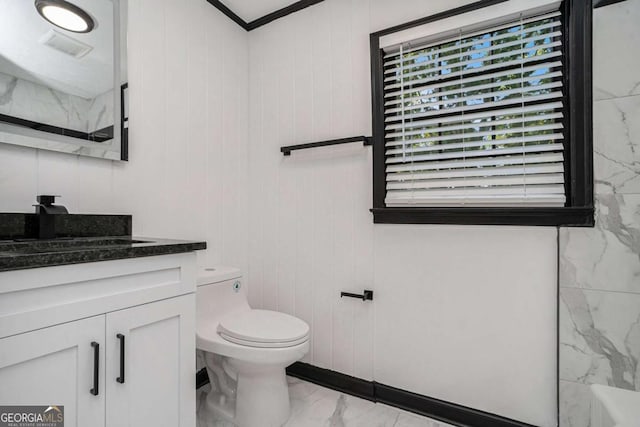 788 Sherwood Rd, Gainesville, GA 30501 - bathroom with marble finish floors, vanity, healthy amount of natural light, and toilet
