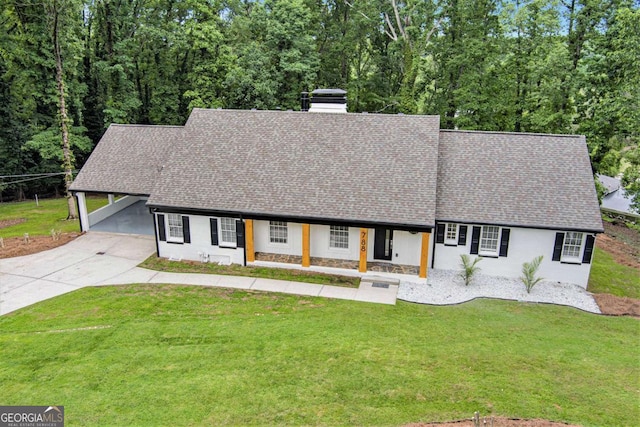 788 Sherwood Rd, Gainesville, GA 30501 - view of front of property featuring a chimney, a front yard, concrete driveway, stone siding, and a shingled roof