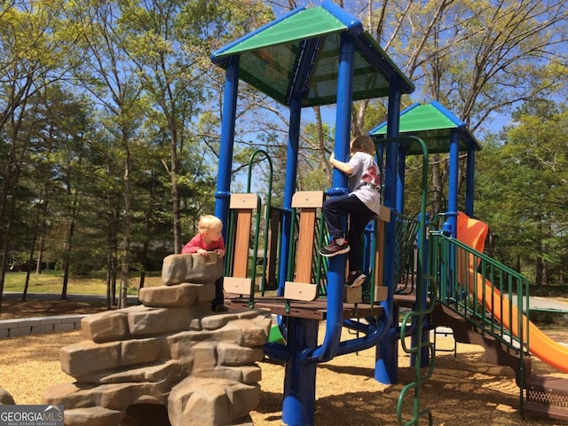 788 Sherwood Rd, Gainesville, GA 30501 - community jungle gym with view of wooded area