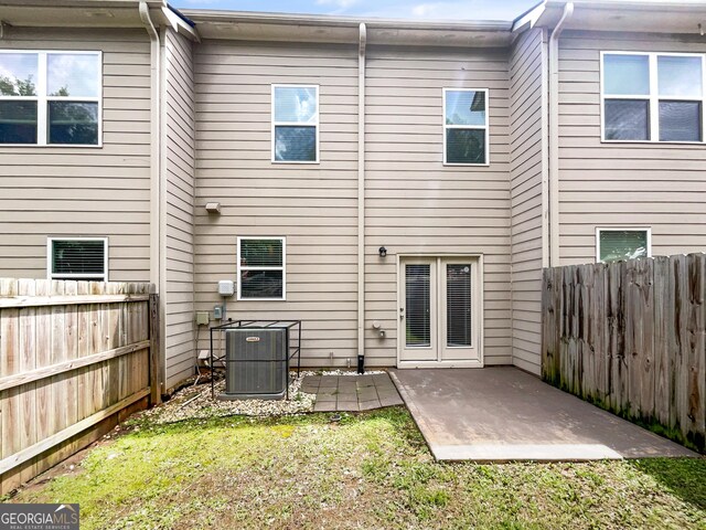 4922 Longview Walk, Decatur, GA 30035 - rear view of house with a patio and a fenced backyard