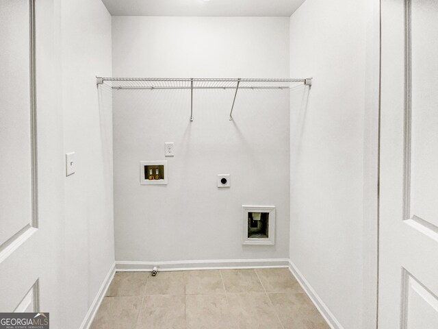 4922 Longview Walk, Decatur, GA 30035 - laundry area featuring electric dryer hookup, hookup for a washing machine, and light tile patterned floors