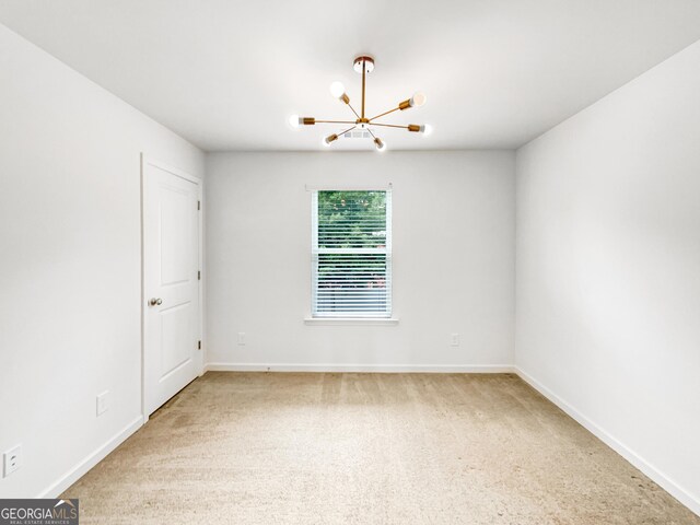 4922 Longview Walk, Decatur, GA 30035 - unfurnished room featuring a chandelier and carpet floors
