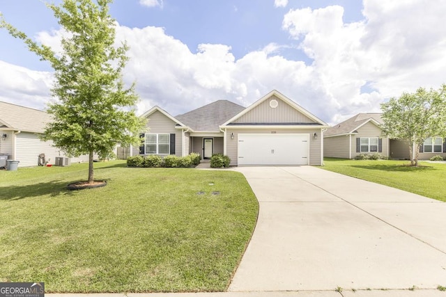 view of front of property with central air condition unit, a garage, driveway, and a front lawn