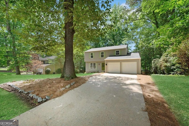 4368 Heritage Glen Ct, Marietta, GA 30068 - view of front of house featuring asphalt driveway, a front lawn, and a garage