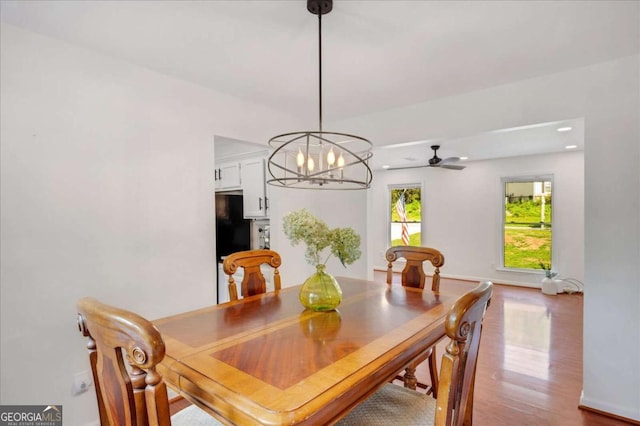 1380 Heritage Glen Dr, Marietta, GA 30068 - dining area with wood finished floors, a chandelier, a ceiling fan, baseboards, and recessed lighting