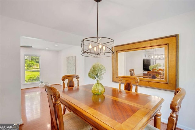 1380 Heritage Glen Dr, Marietta, GA 30068 - dining area with a chandelier, wood finished floors, baseboards, and recessed lighting