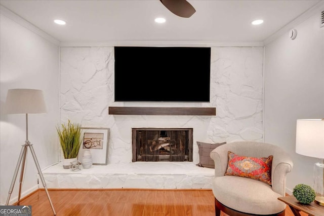 1380 Heritage Glen Dr, Marietta, GA 30068 - living room featuring wood finished floors, recessed lighting, a stone fireplace, and ornamental molding