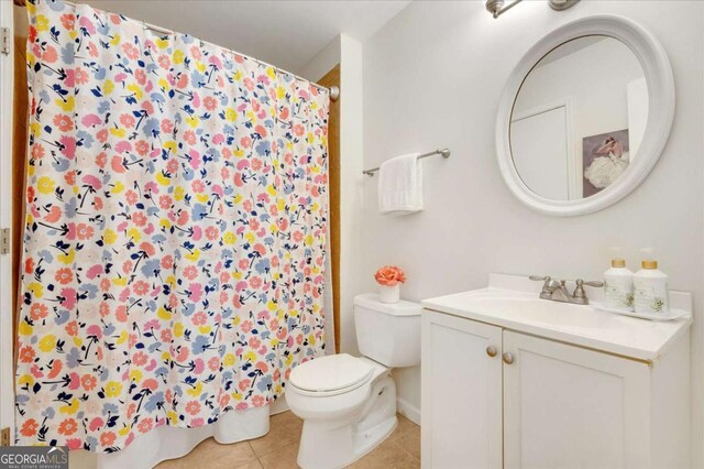 1380 Heritage Glen Dr, Marietta, GA 30068 - full bath featuring tile patterned floors, toilet, a shower with shower curtain, and vanity