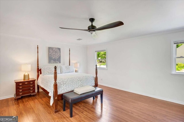 1380 Heritage Glen Dr, Marietta, GA 30068 - bedroom with baseboards, wood finished floors, crown molding, and ceiling fan